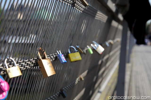 Love locks on the bridge outside Orsay Museum